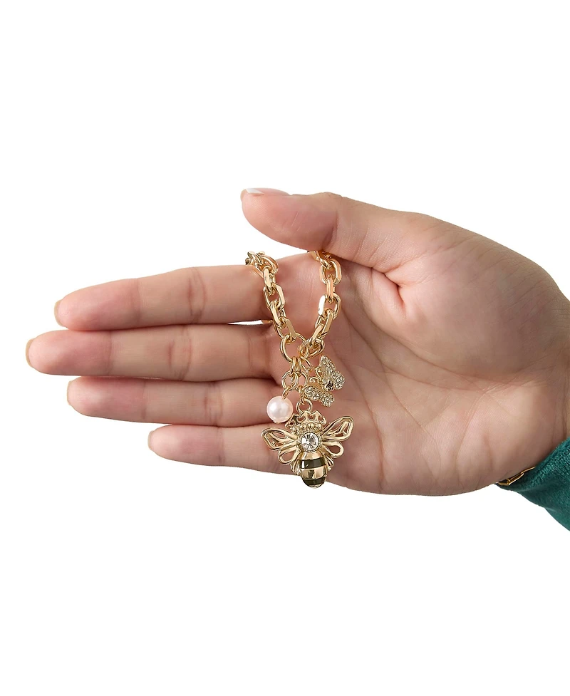 Juicy Couture Charm Cluster Bee Necklace, Gold Tone with Crystal Butterfly & Pearl Accents