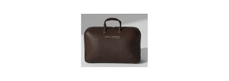 Free The One Male Duffle Bag with any $124 purchase from the Dolce&Gabbana The One Pour Homme Fragrance collection