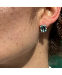 Suzy Levian New York Sterling Silver Emerald Cut Topaz And White Stud Earrings