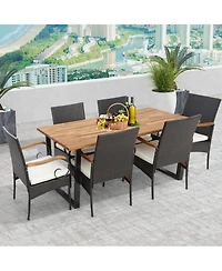 Gouun 7-Piece Patio Rattan Dining Set with 69 in Acacia Wood Table and 6 Cushioned Chairs