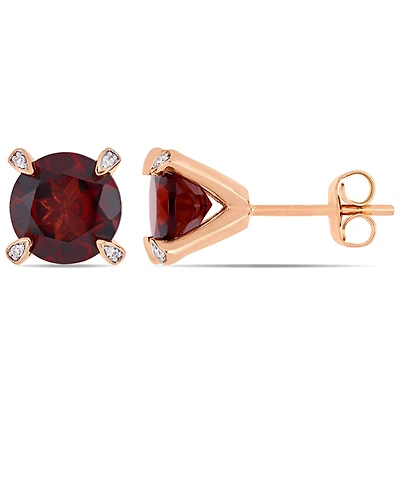 Gemstone and Diamond Accent Stud Earrings in 10k White Gold. Available in Blue Topaz (4-3/4 ct.t.w.), Citrine (3 5/8 ct.t.w), Garnet (4 ct.t.w.), Amet