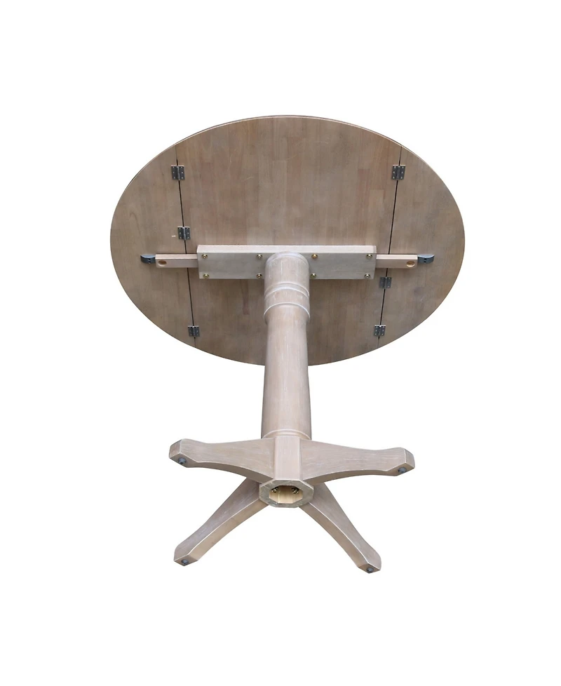 International Concepts 42" Round Dual Drop Leaf Pedestal Table