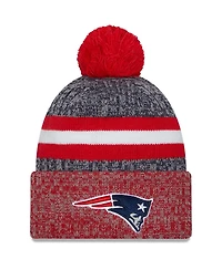 Men's New Era Navy, Red New England Patriots 2023 Sideline Sport Cuffed Pom Knit Hat