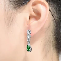 Genevive Cubic Zirconia Sterling Silver Green and Clear Dangle Earrings