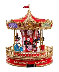 Kurt Adler 11.1-Inch Battery Operated Led Lighted Musical Santa Carousel with Motion Table Piece
