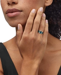 London Blue Topaz (4 ct. t.w.) & Diamond (1/4 ct. t.w.) Oval Trio Halo Ring in 10k Gold