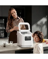 Zafro Countertop Ice Maker produces lbs of ice daily, featuring an Led display, timer, self-cleaning function, and a portable handle. Its compact desi