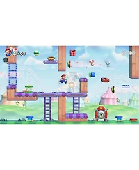 Nintendo Switch White Oled Console with Mario vs. Donkey Kong, Nso 12 Month Family Membership, MightySkins Console and Controller Skin Voucher