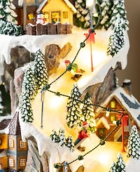 Glitzhome 15.5" Lighted Resin Christmas Skiing Mountain Village