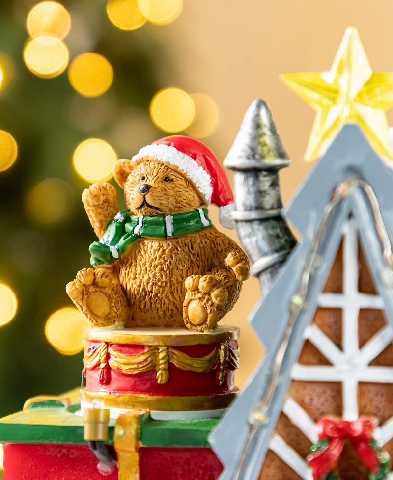 Glitzhome 10.75" Lighted Resin Christmas Toy Market Village
