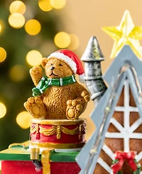 Glitzhome 10.75" Lighted Resin Christmas Toy Market Village