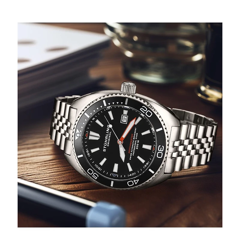 Stuhrling 1008 Men s Automatic Watch Swiss Movement Tonneau Stainless Steel Case Black Dial Bezel Jubilee Bracelet 200M Water Resistant Date Window
