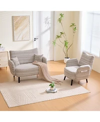 Streamdale Furniture Modern two-seater sofa with armrests, pillows, and storage pockets.