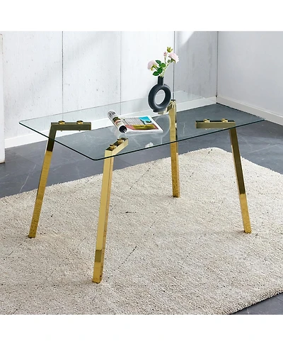 Streamdale Furniture Modern minimalist rectangular glass dining table with golden metal legs.