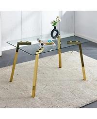 Streamdale Furniture Modern minimalist rectangular glass dining table with golden metal legs.