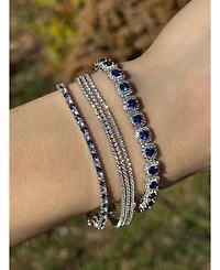 Suzy Levian Sterling Sapphire Halo Tennis Bracelet