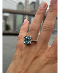 Suzy Levian New York Sterling Silver Emerald Cut Topaz Halo Ring