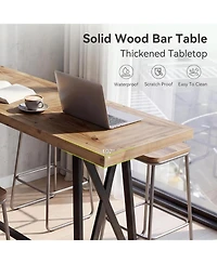 Tribesigns Solid Wood Bar Table with Metal Footrest, 63 Inch Long Counter Height Pub Table Industrial Tall Bistro Tables