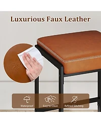 Mecale Set of 4 Counter-Height Bar Stools with Faux Leather Seat