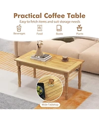 Mecale 35.5 in Teak Coffee Table with Carved Turned Legs