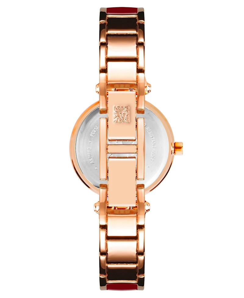Anne Klein Women's Three Hand Quartz Gold-tone Alloy and Light Blue Marbled Acrylic Link Bracelet Watch, 30mm