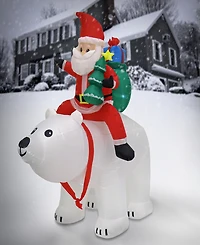 National Tree Company First Traditions Inflatable Santa Riding Polar Bear 6 ft.