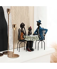 LuxenHome Modern Brown Polyresin Couple Date Night Tabletop Home Decor