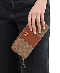 Coach Essential Signature Canvas Slim Accordion Zip Wallet