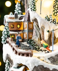 Glitzhome 15.5" Lighted Resin Christmas Skiing Mountain Village