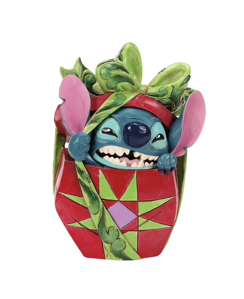 Jim Shore Stitch Tearing Present Figurine