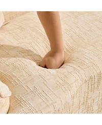 Streamdale Furniture Beige curved two-person compress sofa with armrests and two pillows.