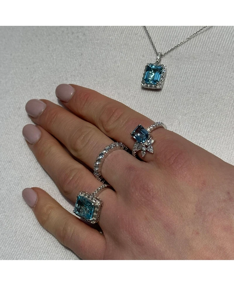 Suzy Levian New York Sterling Silver Emerald Cut Topaz Halo Ring