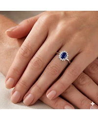 Simona Elegant Oval Sapphire Halo Cz Flower Design Ring