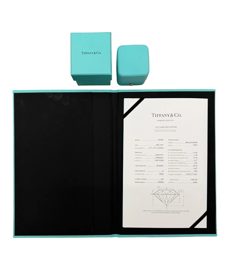 Pre-Owned Tiffany & Co 0.9 ct Round Brilliant Diamond Ribbon Engagement Ring
