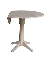International Concepts 42" Round Dual Drop Leaf Pedestal Table