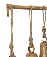 Rosemary Lane Gray Metal Tibetan Inspired Meditation Decorative Cow Bell with Jute Hanging Rope and Rod 48" x 5" x 28"