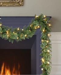 Puleo 9' x 10" Pre-Lit Garland with Battery Operated Timer