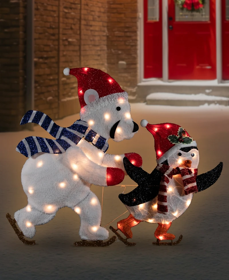Northlight 41.25" Lighted Ice-Skating Polar Bear and Penguin Outdoor Christmas Decoration