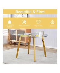 Simplie Fun Table and chair set.a Modern Minimalist Style Round Clear Tempered Glass Table with Metal Legs.Paired with white chairs with Modern Pu Lea