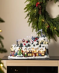 Glitzhome 16" Christmas Oversized Resin Lighted Musical Skiing Village