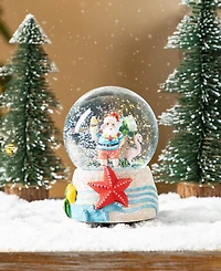 Glitzhome 100mm Resin Christmas Musical Snowflakes Santa on Vacation Water Globe