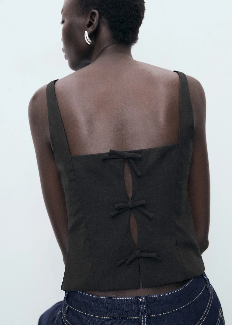 Top with bows on the back