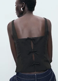 Top with bows on the back