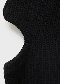 Knitted sweater with openings