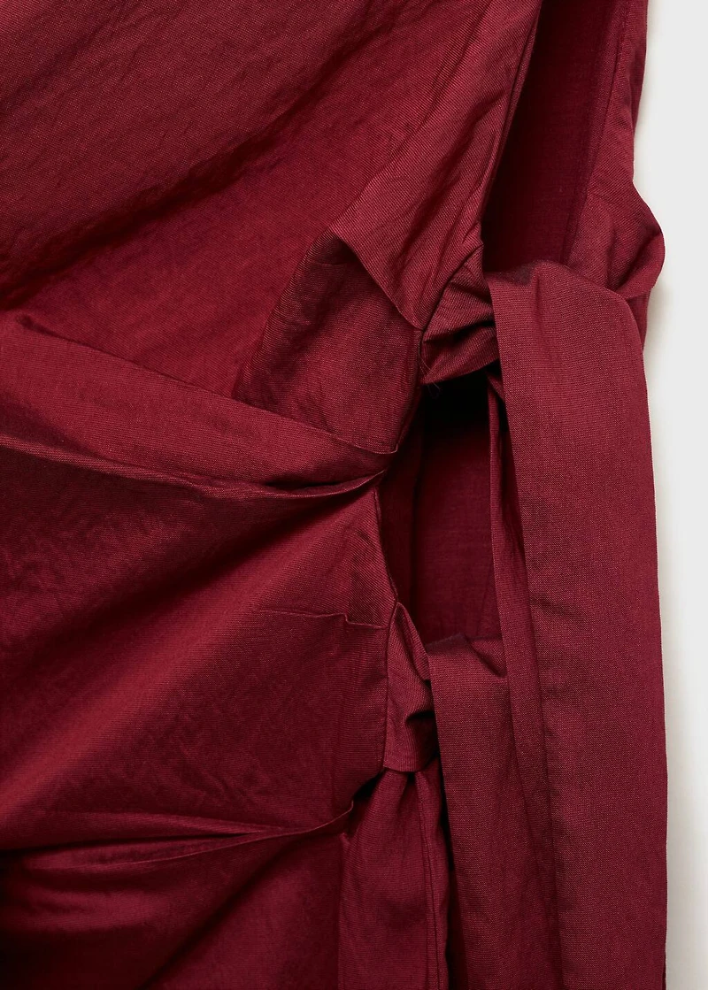 Asymmetrical knotted dress