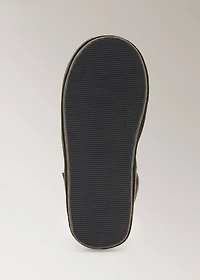 Leather slippers with shearling lining