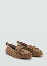 Leather moccasins with fur lining