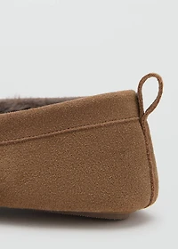 Leather moccasins with fur lining