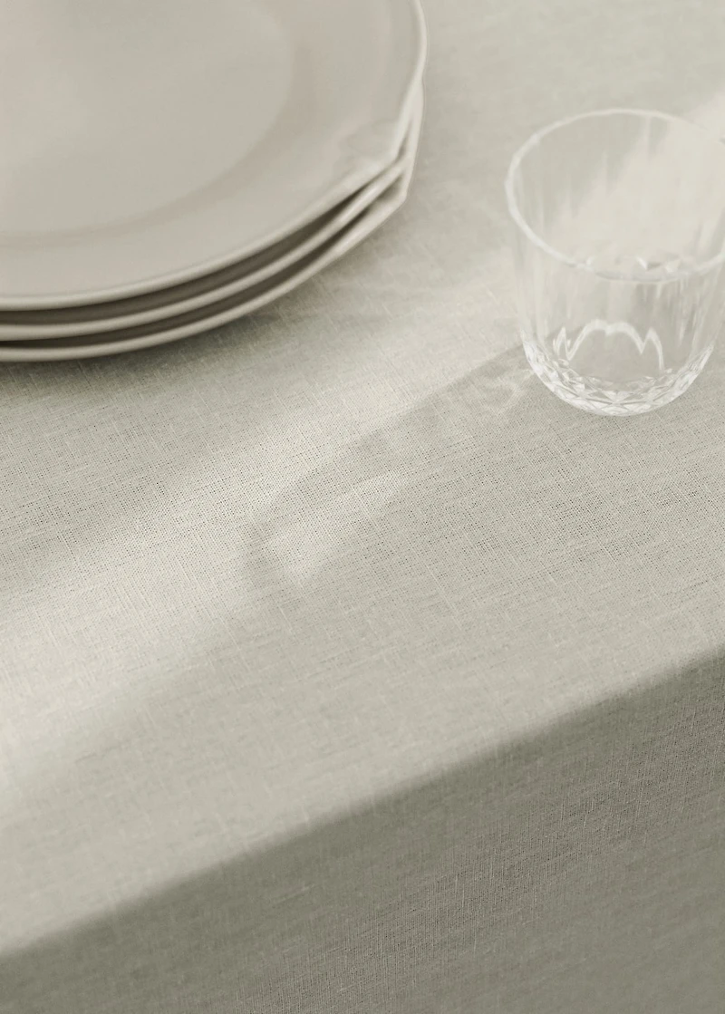 Resin-coated linen tablecloth with contrast overlock for 2 to 4 diners