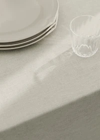 Resin-coated linen tablecloth with contrast overlock for 2 to 4 diners
